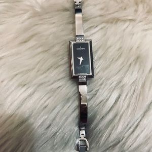 NWT.  Movado Ladies’ DressWatch with Diamonds